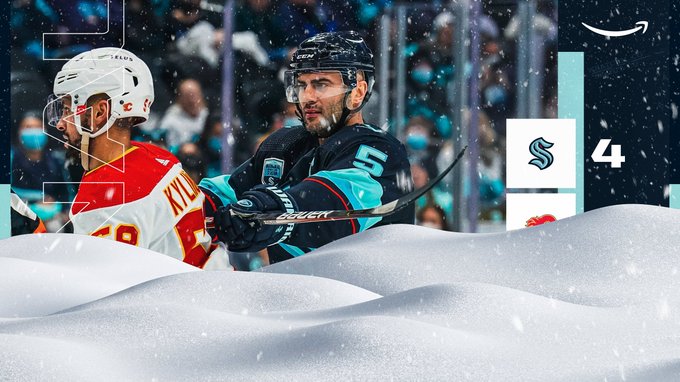 final score graphic with image of mark giordano in center. There's snow over the graphic so you can't see the score kraken loss