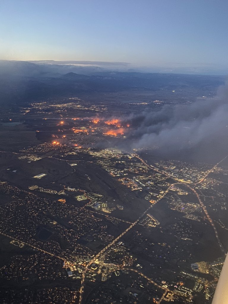 DenverChannel's tweet photo. This is what two people saw over the skies of Colorado as they flew out of DIA earlier today. Fire officials believe downed power lines ignited the 1,600-acre #MarshallFire. Lates updates: https://t.co/dT0cHPhWDZ https://t.co/KYOlEx5AJ0