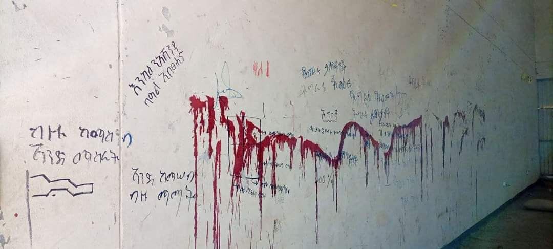 MOusmanova's tweet photo. This graffitti picture written with human blood is found in Woldia University, Amraha region. TPLF butchered civilians in unimaginable ways during their stay in an occupied Amhara&amp;Afar. Such is the evil way of sending 'love' for the #Ethiopia|n people. #TPLFisawarcriminal https://t.co/sm7V9xlpzS