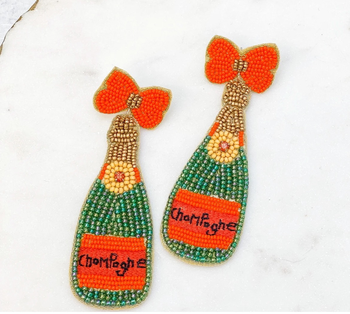 French75B's tweet photo. Celebrate #newyearseve in #french75boutique style! These #champagne earrings are the perfect statement piece for your soirée. Open today 11-4 with end-of-year sale still in progress. https://t.co/GJTWz6JpsT