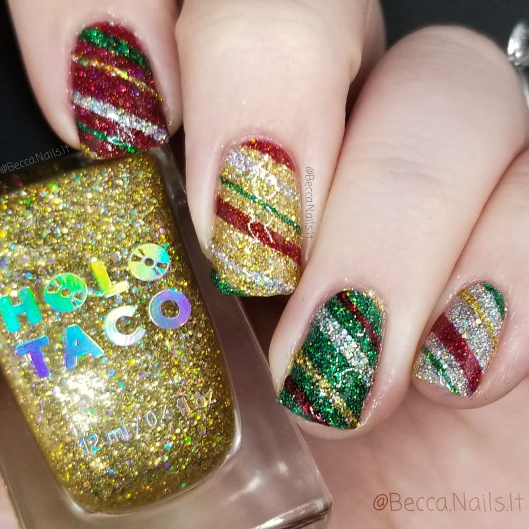 BeccaNailsIt's tweet photo. @/nails.by.safia and @/5_nailsart hosted a #ChristmasSkittleNailsCollab that was so much fun!

For my design I did the stripped wrapping paper I've been seeing everywhere after @nailogical's video. My favorite nail was probably the green one, what is your favorite? https://t.co/jc5DgZkeFz