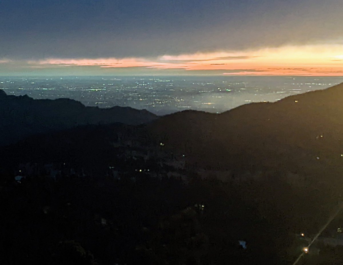 IvanGirderboot's tweet photo. An encouraging sign just before dawn from the #MarshallFire -- from my vantage point in Coal Creek Canyon, very little smoke and almost no flames visible.  Most of the lights I see are emergency vehicles. https://t.co/DBPd89AcEv