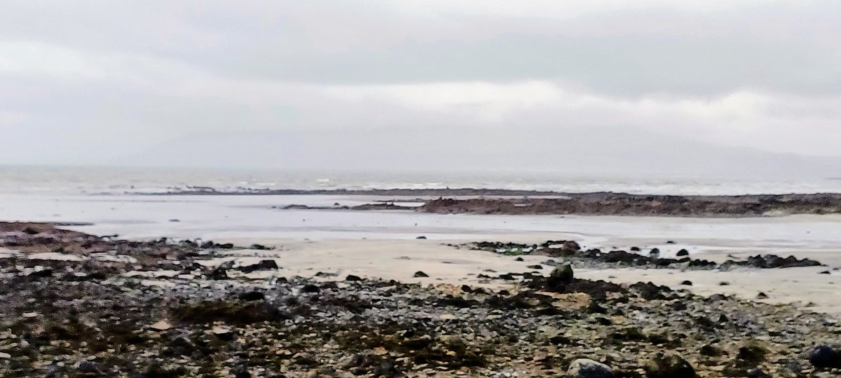 PatrickJMB's tweet photo. Mournes just visible from Rossglass 
Cool wind https://t.co/HfOX8UwYZo