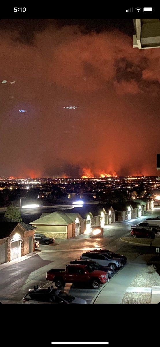 View from a friend’s balcony last night, roughly 12 miles from the #MarshallFire . Some evac orders lifted, but we’re still on high alert here waiting for updates.