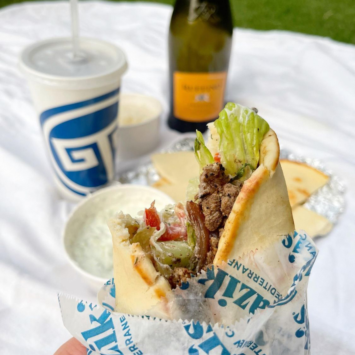 Gyros taste better when paired with a good glass of bubbly. Happy New Year! #tazikis #livethegoodlife