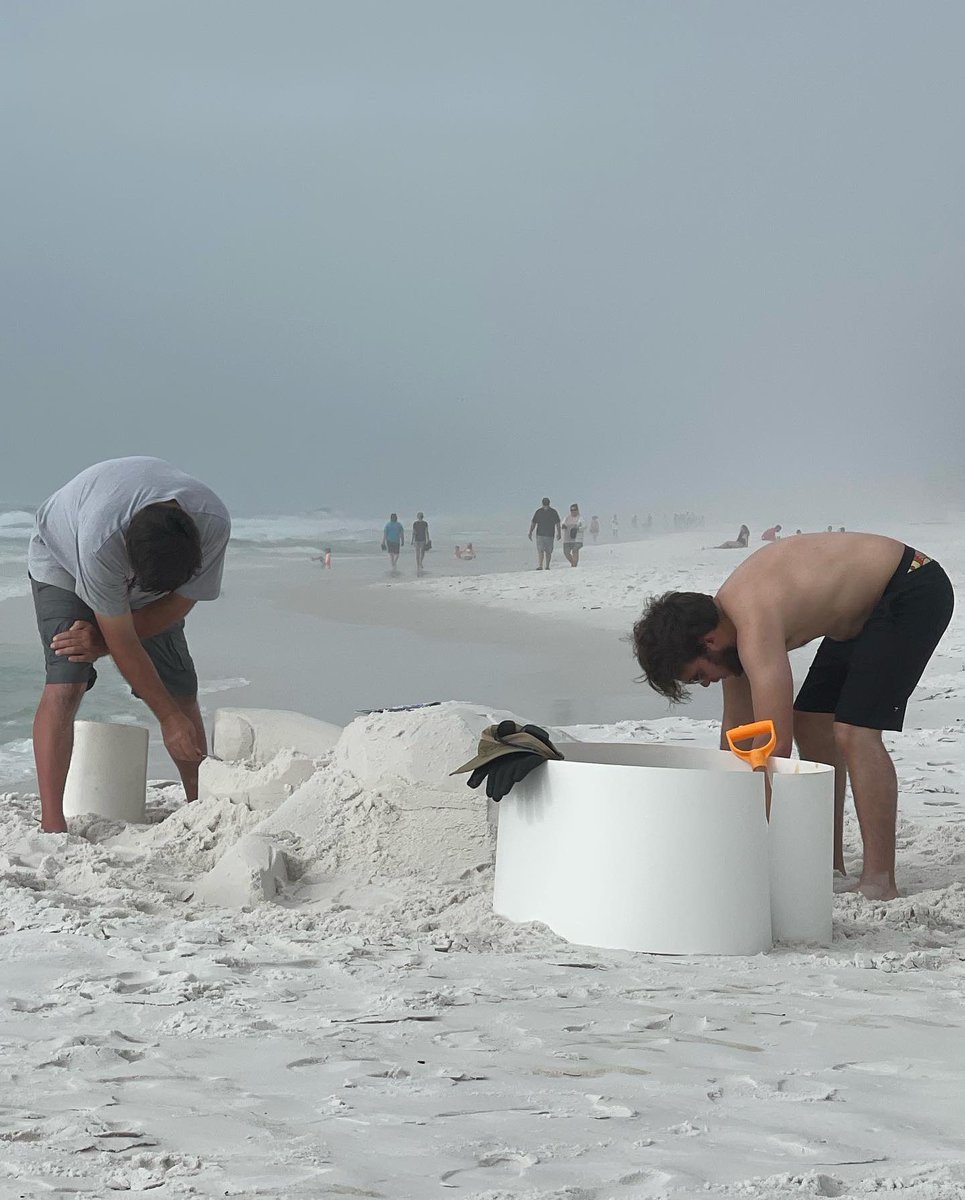 CorieHaynes's tweet photo. Sand sculptures yesterday and this morning… waiting to see what this next one is going to be! #RIP2021 #beachinit #HappyNewYear https://t.co/NFqZw1ohLi