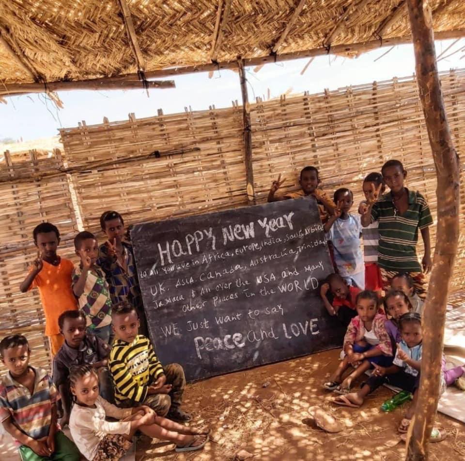 SeifGebre's tweet photo. Happy #NewYear2022. Let 2022 brings hope, peace and optimism to #Tigray and the world.

(Picture below: last year’s Happy New Year message from Tigray refugee children in #Sudan) https://t.co/xGenmT0nh0