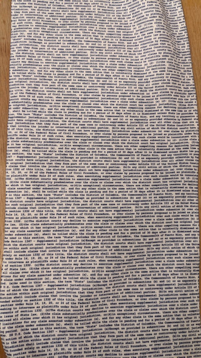 Most creative (and apt) gift ever from my civ pro students, a scarf that recites the text of 28 USC 1367 endlessly.