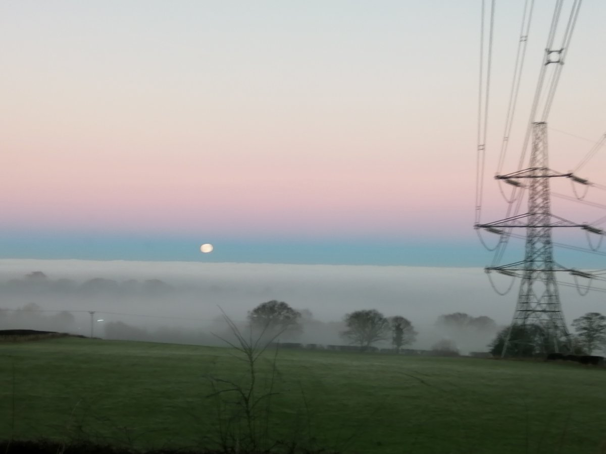 AMcKT's tweet photo. Much better in real life but beautiful moonrise from #pentrehalkyn @BerkinsBetty this afternoon. Overlooking the Wirral but it was shrouded in fog... @DerekTheWeather @Ruth_ITV @Sue_Charles https://t.co/VGjL3hHOq5