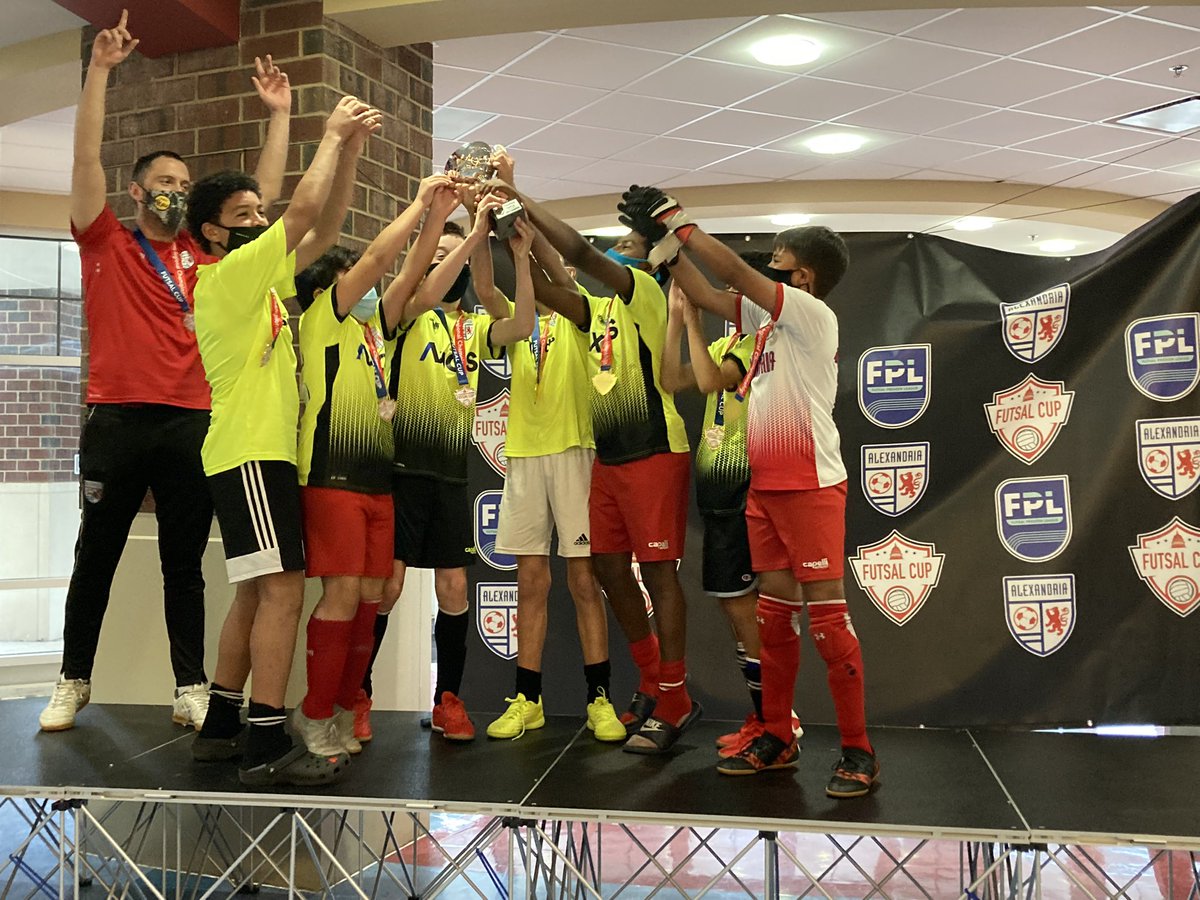 Size5Ball's tweet photo. Congrats @AlexandriaSoc #Futsal #2009BoysElite team for raising the #FutsalCup @  #MidAtlanticRegionalChampionship in Alex, VA. A fierce battle against #ASA2009BoysRed.  Super proud of these boys and our #12 for stepping-in from court player to goalie! w/#CoachMitch. #Champions https://t.co/mhFFCNpg7P