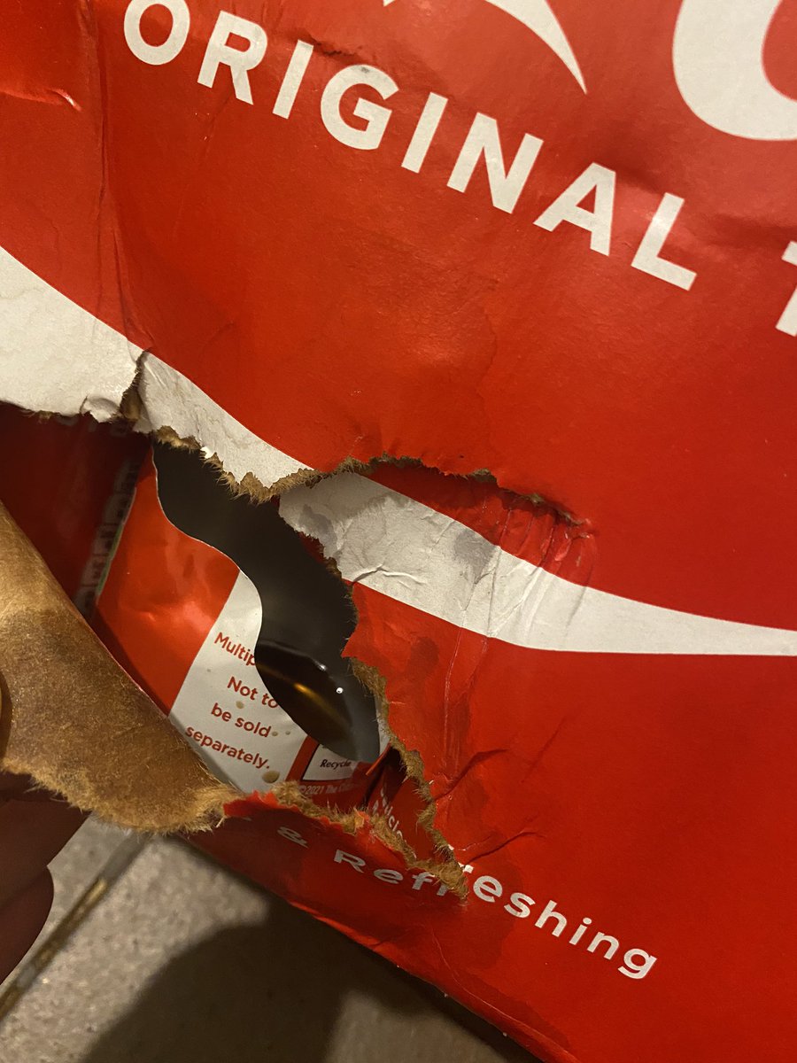 nclshly's tweet photo. @Tesco hi! We noticed that our crate of coke was wet at the bottom upon delivery but somehow missed this gaping hole in one of the cans. Do I have to take the crate back to store? We don’t drive 😬 thanks ☺️ https://t.co/xS1UC6PaSn