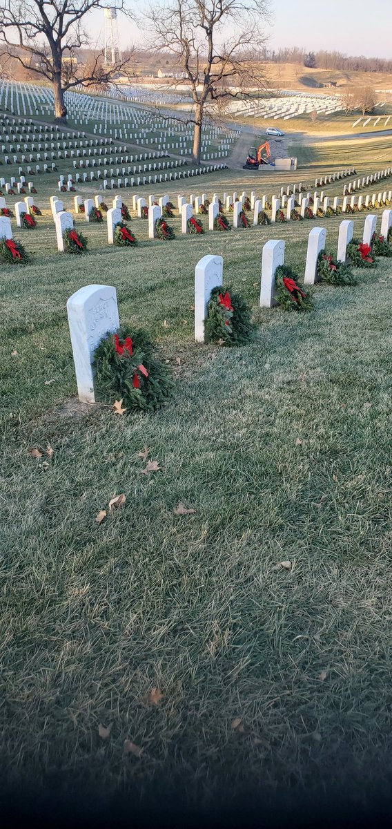 GGCalwel's tweet photo. Decorated headstones at the VA national cemetery https://t.co/adBh9irlcB