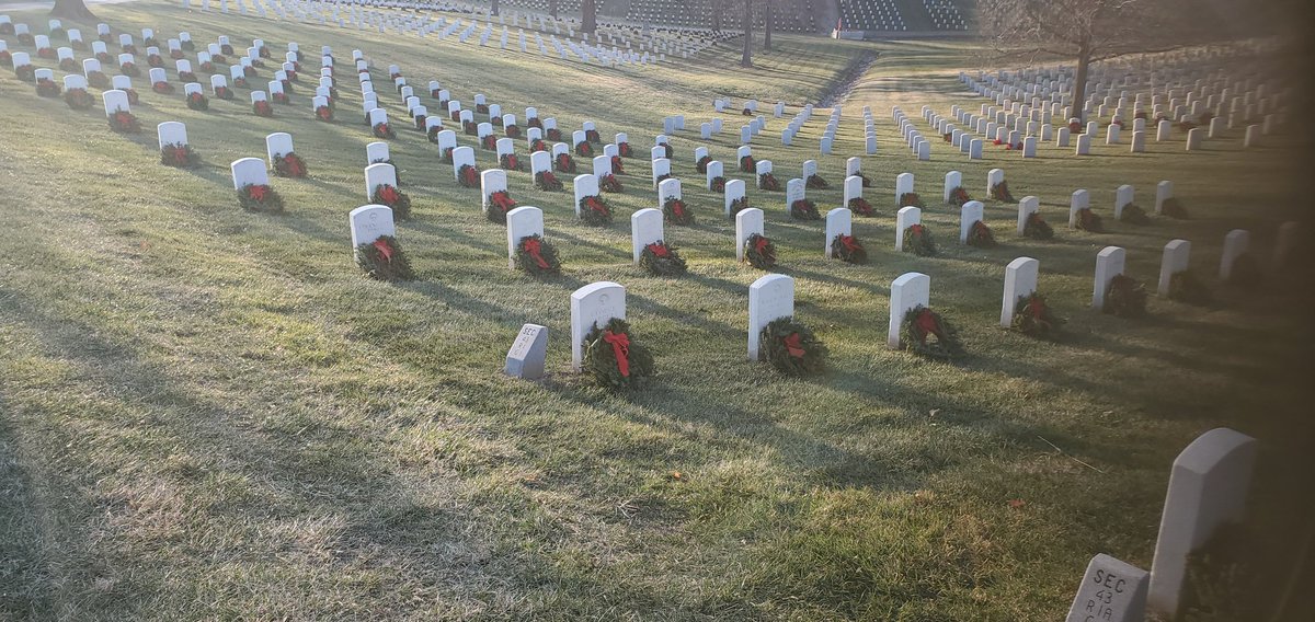 GGCalwel's tweet photo. Decorated headstones at the VA national cemetery https://t.co/adBh9irlcB