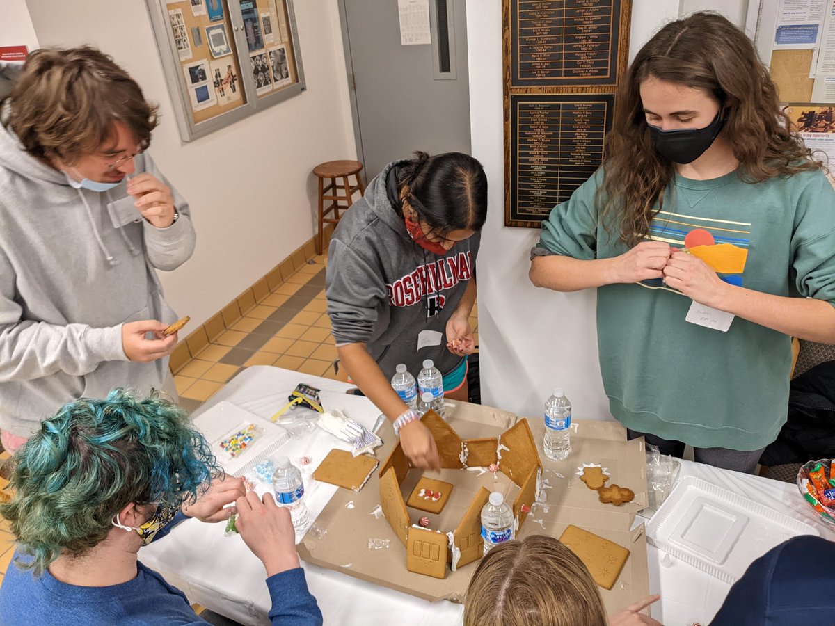 RoseHulman's tweet photo. Physics, optical engineering &amp; engineering physics students got in the holiday spirit by building gingerbread houses, decorating the department tree &amp; enjoying treats before leaving campus for the break. Enjoy the time with family &amp; friends. See you next year! #rosehulman https://t.co/IUEVPwvRsE