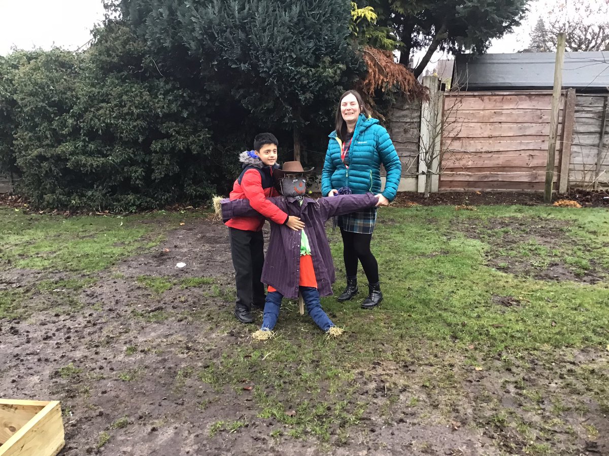 woodheysprimary's tweet photo. Hussain and Mrs Rice have been working hard on making a wonderful scarecrow for the new vegetable patches at school. We need a name for it now. Maybe Year 5 can come up with one… https://t.co/QNE0s0xfEQ