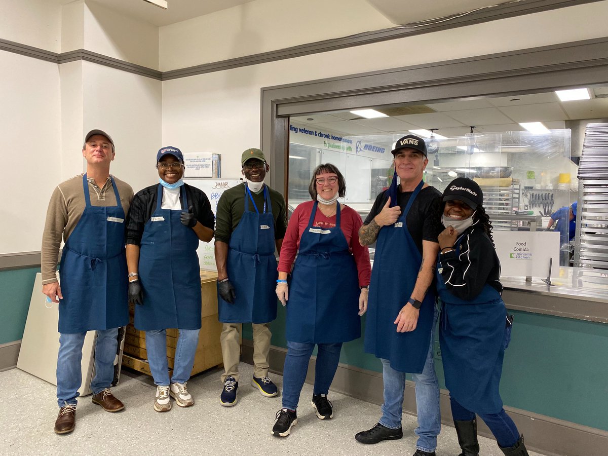 PostHelpingHand's tweet photo. Look at those smiles! Members of the @WashingtonPost Client Solutions team kindly volunteering at @PostHelpingHand charity @MiriamsKitchen Friday. Learn more + donated to our three #PostHelpingHand beneficiaries today at https://t.co/WCgUGT3JiH https://t.co/zr55OoAHx6