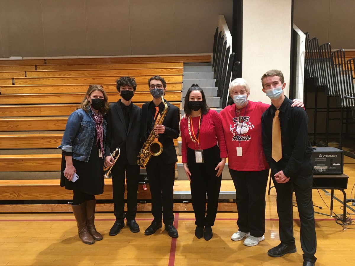 The NHHS Jazz Ensemble, Show Choir and String Orchestra gave a concert for middle school students at Clinton Public School.  Spreading the holiday cheer.  #LionPride