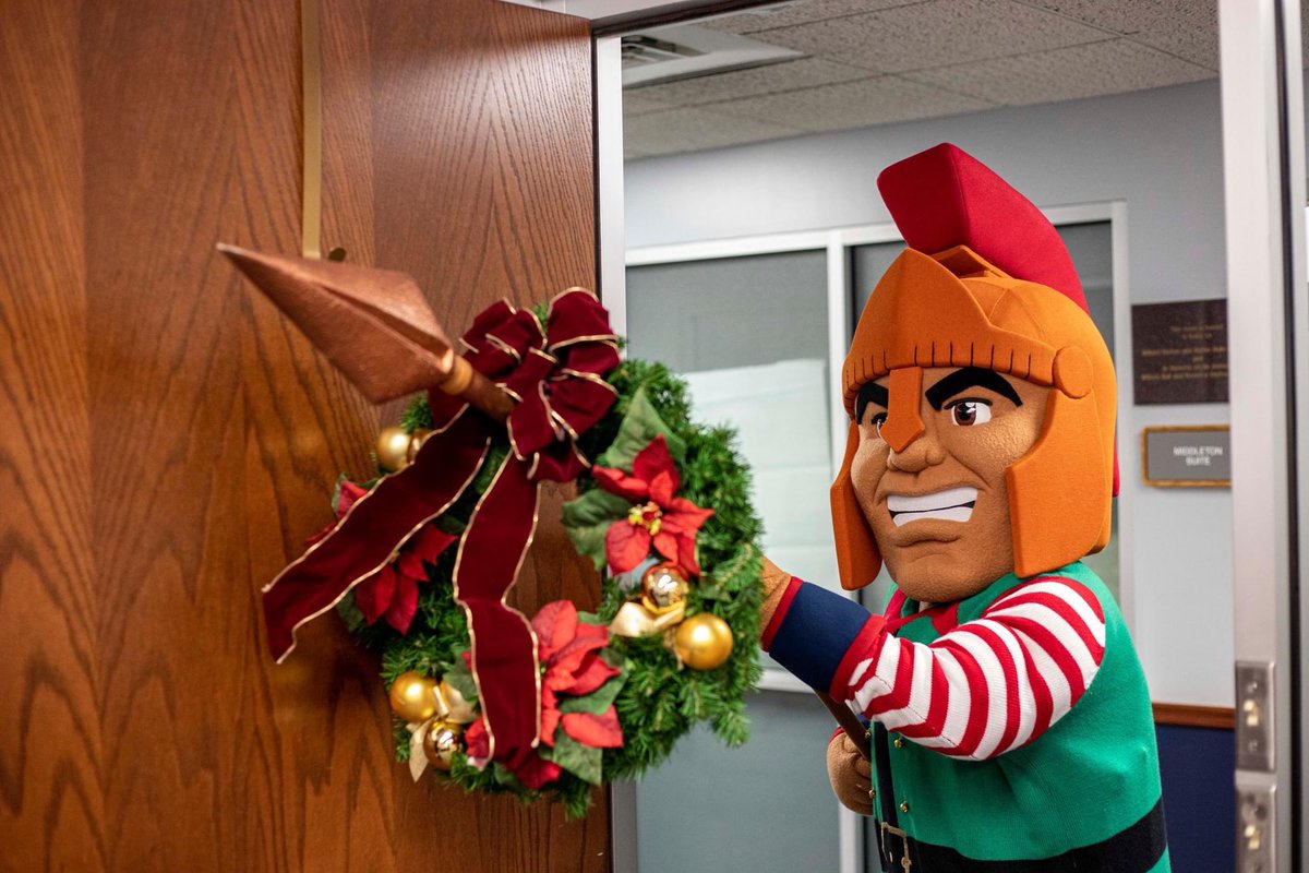 HLGuniversity's tweet photo. When in the halls of the admin, there arose such a clatter,
I sprang from my office to see what was the matter.
And what to my wondering eyes should appear,
But a mischievous Trojan with a wreath on his spear. https://t.co/EQlkb2HF2W