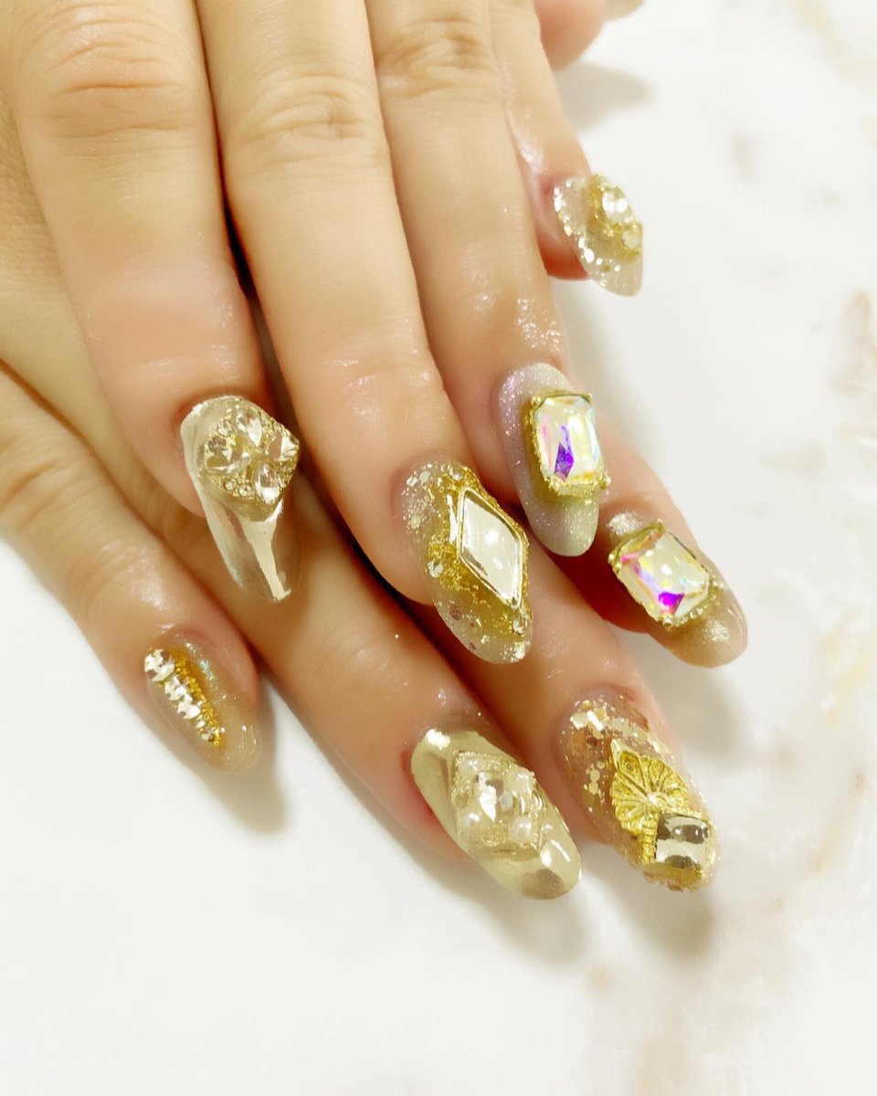 ENA0568's tweet photo. 今年最後のネイル💅
gold&amp;silver ラメ　マグネット　mirror
新作パーツで盛りだくさん💅
お任せでも好みわかってるからかわいく
なるのは間違いない❤️
@yui_ewy_ 
@__ewy__ 
いつもありがとう😋
#nail#japan#ewy#吉祥寺#kichijoji#newnail#ネイル#original#オリジナル#new#派手好き#cute#jelnail#ewy https://t.co/wknrEhKX6G