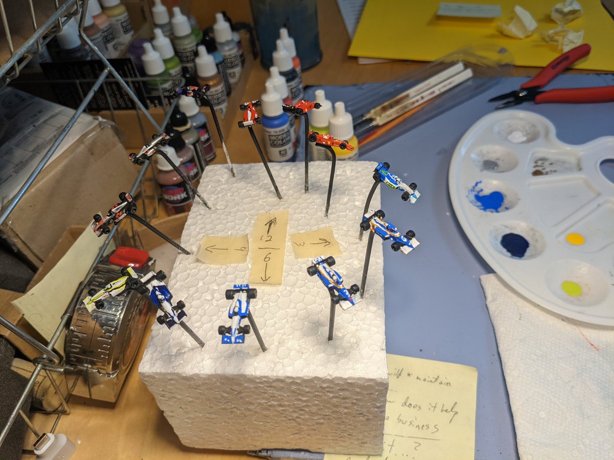 lucidphoenix's tweet image. Painting some F1 cars.