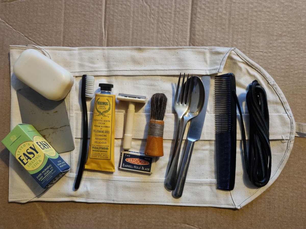 marksimner's tweet image. British Army holdall (today more commonly referred to as a wash roll) broadly representative of items typically carried late in the Second World War. Most items are original from the period, the toothpaste, shaving stick, and soap being reproductions. #WW2 #SmallKit