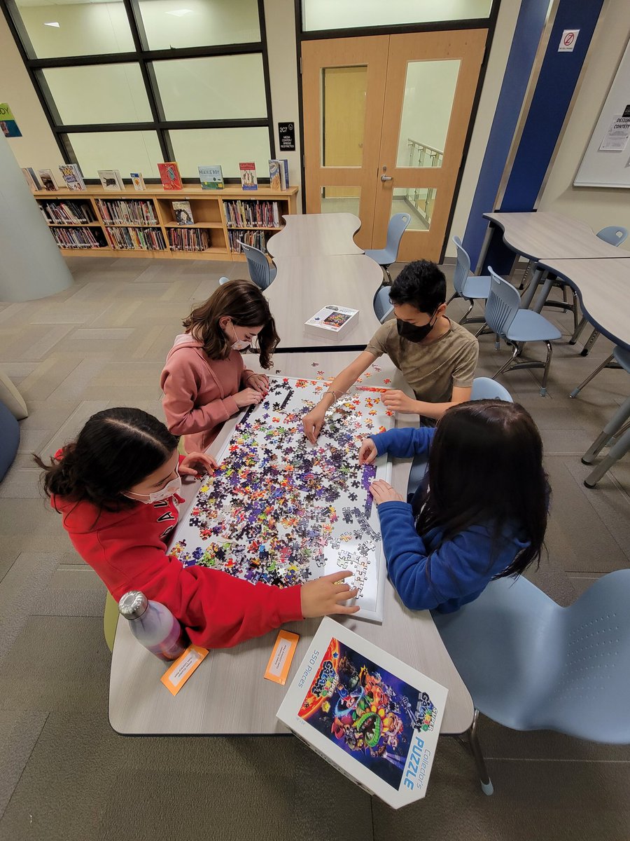 BMSLibraryRI's tweet photo. These eighth-graders are completely immersed in "puzzling" as they call it. Super Mario for the win. #bmsshines #communitypuzzle https://t.co/2tTdpKzOi2