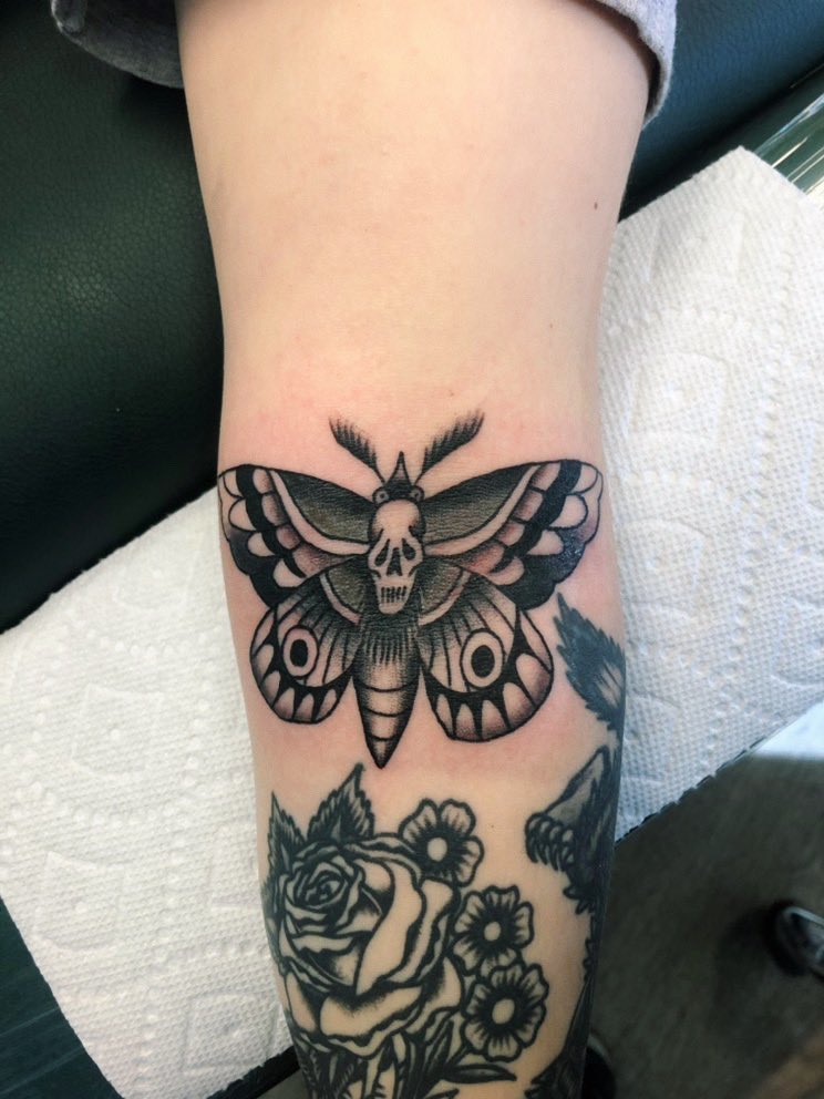 Santa came early this year and showed up with a needle and some ink 🖤💀🦋 #deathmoth #traditionaltattoo