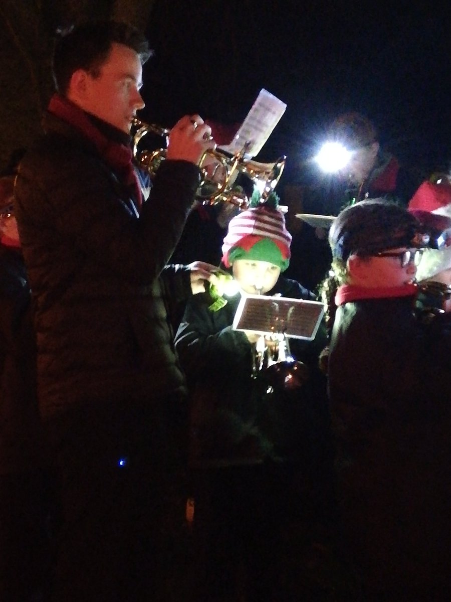 dobcross_youth's tweet photo. How lovely is this? Associate musical director @LazyTrumpeter97 playing one-handed so he can shine a torch for one of his young training band players https://t.co/7Lt1cRmUYZ