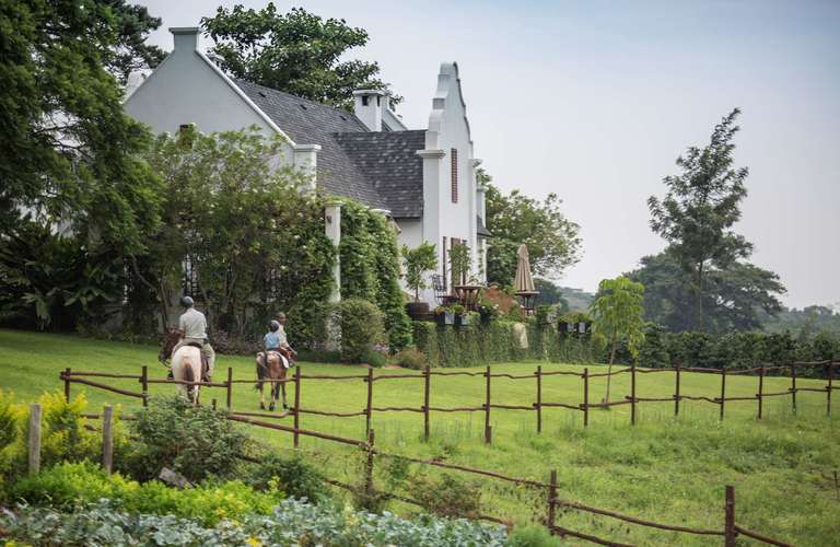 AvondaleTravel's tweet photo. Elewana The Manor at Ngorongoro is a Cape Dutch-style farmhouse situated in a 1,500-acre working coffee plantation in Tanzania. Guests can go horseback riding through the fields or play croquet on the lawn. https://t.co/wvEnyzANji