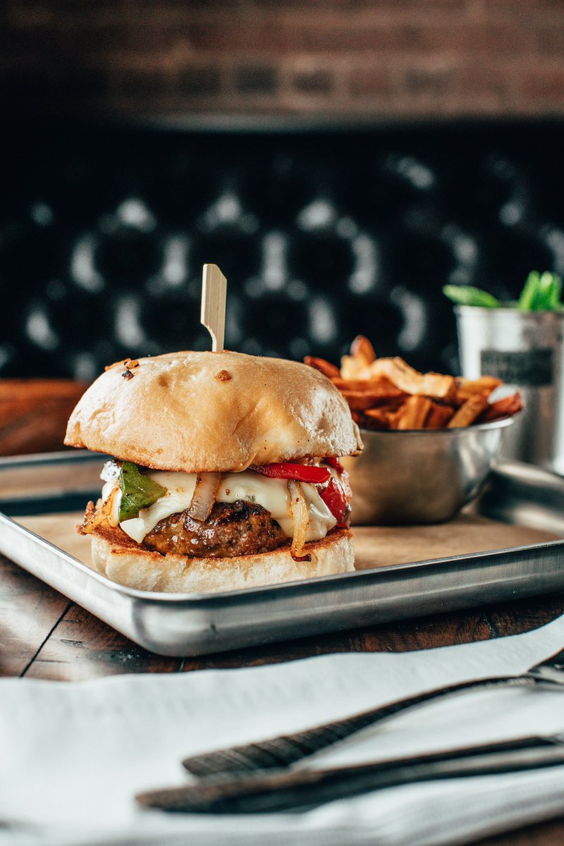 The Chorizo Burger.🍔🔥 house-blend ground beef and chorizo sausage patty, topped with pepper jack cheese, grilled peppers, onions &amp; a smoky chipotle mayo. Served on our sweet onion roll.🔥