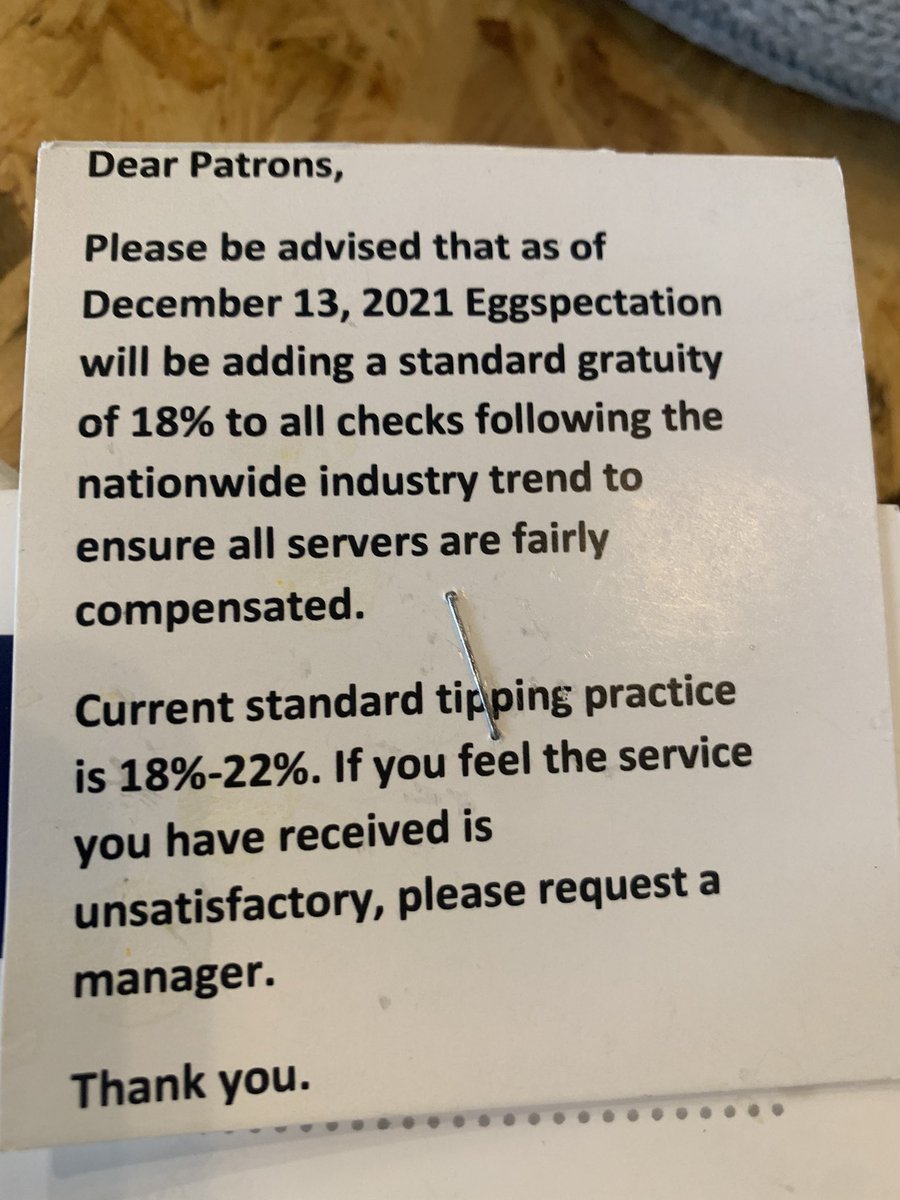 Jonn_Mack's tweet photo. So I go to #eggspectations in Owings Mills today and I saw this attached to my menu. How about instead of an automatic gratuity that you increase your pay per hour. 🤷🏾♂️🤷🏾♂️ #increasetheirpay #payworkers #fairpay #fairwork https://t.co/CIJVADdnzF