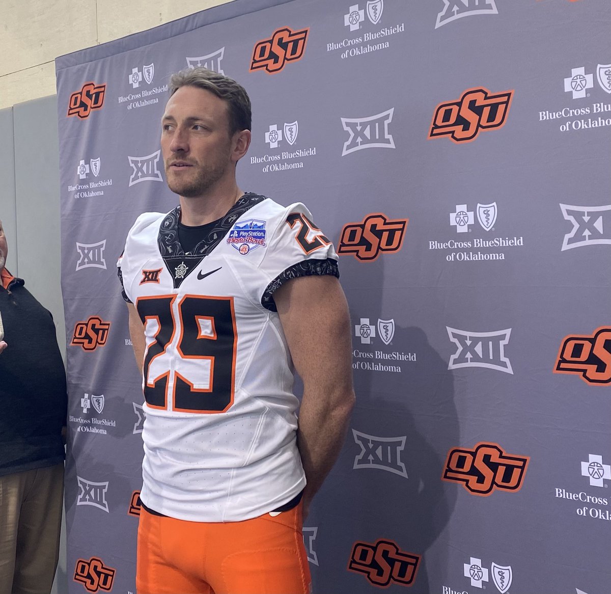 ByEliLederman's tweet image. First look at an Oklahoma State’s uniform with the Fiesta Bowl patch, feat. 31-year old punter Tom Hutton