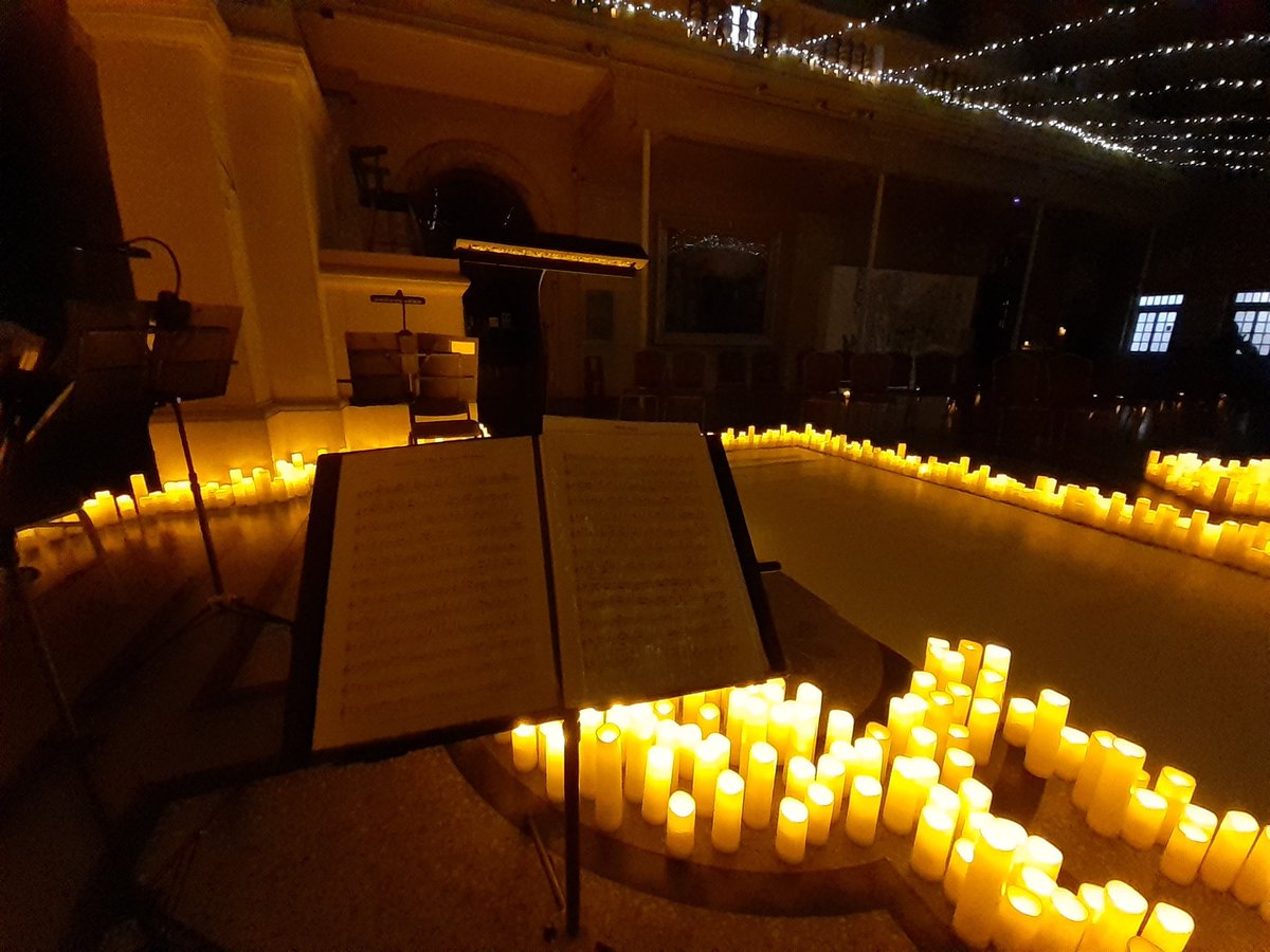 violin_sarah's tweet photo. View from my music stand tonight with @ardetonquartet for shows no.36 and 37 of Swan Lake and more with #FeverUK #Candlelight surrounded by thousands of twinkling candles https://t.co/GcxHq7Rsq0