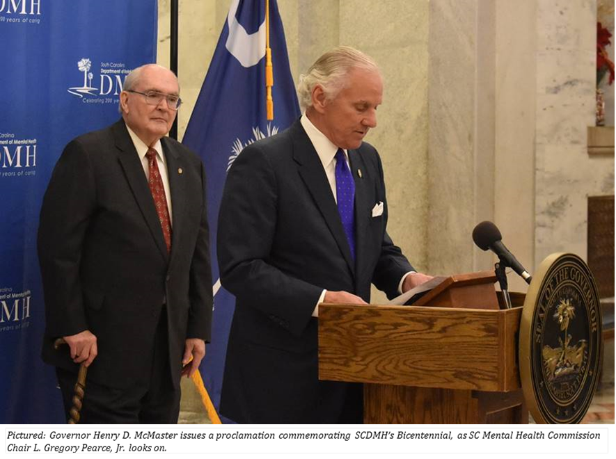 Roads_SC's tweet photo. On Dec. 8, following comments from SCMH Commission Chair L. Gregory Pearce, Jr, SCDMH Legislative and Governmental Affairs Director Mark Binkley, and SCDMH State Director Kenneth Rogers, MD, Governor Henry D. McMaster issued a proclamation commemorating SCDMH's 200 years. https://t.co/9aQLdRJqAQ