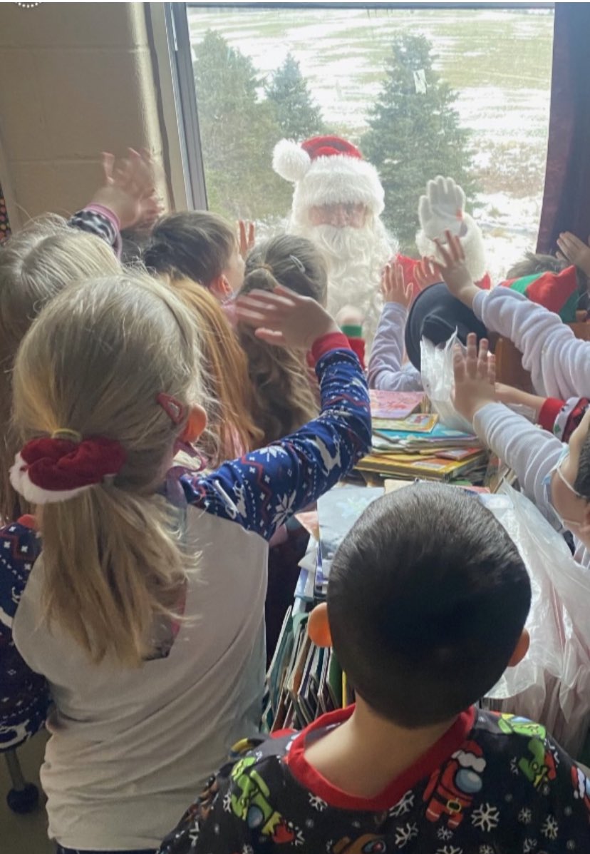 Goulds_Elem's tweet photo. If you look really closely, you may see Santa’s sleigh in the field. Perfect landing this morning for Santa and his reindeer@Goulds_Elem@nlesd #magicalmoments #windowvisit #excitement https://t.co/PKgXeTQAub