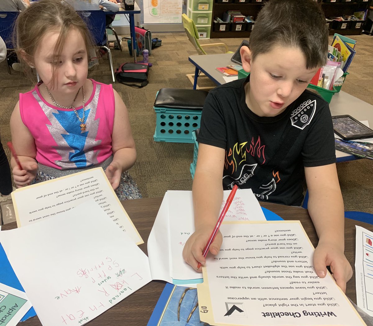 JordanFink24's tweet photo. Friends helping friends using their writing checklists during small group! (Without being asked to!!) #learneragency #teamwork #teamlowell https://t.co/PF0e4dT79S