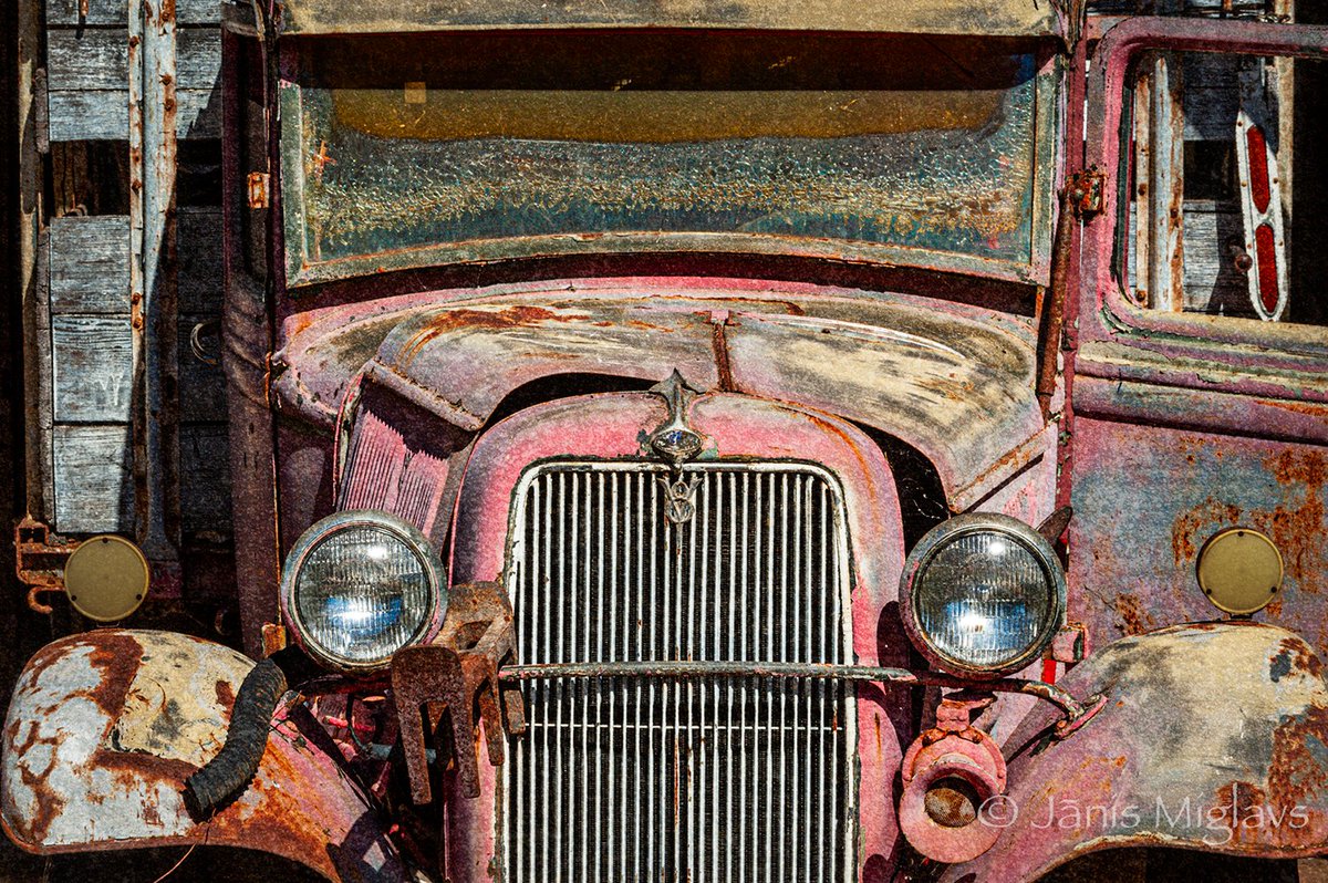 JanisMiglavs's tweet photo. What do you think of my new wheels? I wanted to buy a big black Ram pickup just like all those real-macho-men types with tattered USA flags flapping back in the truck bed. Wise wife Eddi said no way. So here's my real all-American truck. I painted it pink. What do you think? https://t.co/87XG4zU0nH