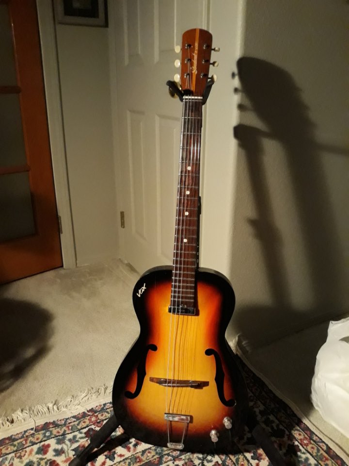 RiotSeeds's tweet photo. The #vintageguitar VOX #studentprince acoustic / electric from the 60s.  This is my main jammer to bang around on. She just got all new frets and some stamped and aged #KlusonTuners - I am a Vox fiend. #guitars #voxguitars https://t.co/VI8fHNjmON