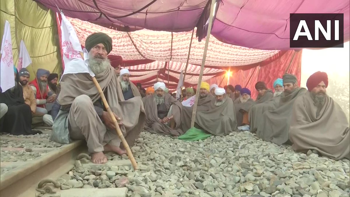 ANI's tweet photo. Punjab: Kisan Mazdoor Sangharsh Committee 'rail roko' agitation continues in Devidaspura, Amritsar over various demands-farm loan waiver, compensation, jobs for families of farmers who died in farm protest

16 trains today &amp; 35 y'day (Dec 20) have been cancelled: Indian Railways https://t.co/u7ASgVFKfr
