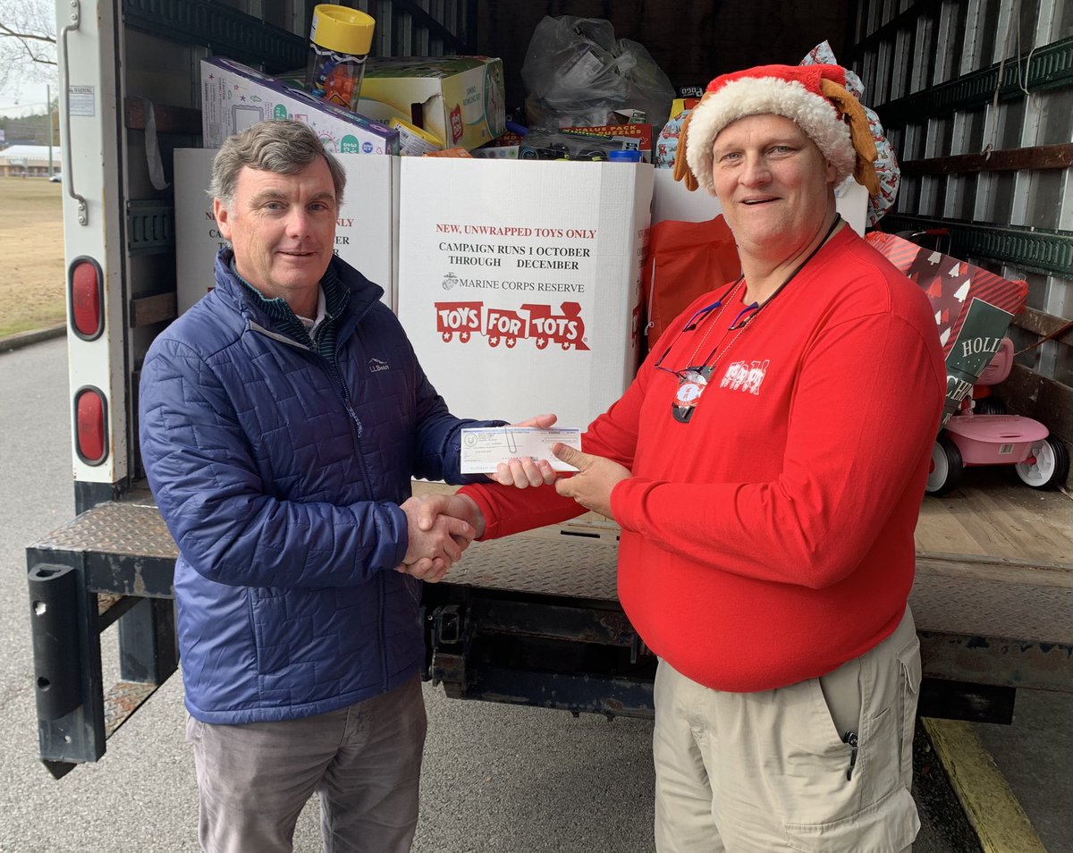 SCDCNews's tweet photo. We filled up the @ToysForTots_USA truck along with a check for almost $5,000 from inmate donations. #Thankful for our employees and inmates who are sharing the #ChristmasSpirit with children across SC. #BetterTogether #WeAreCorrections https://t.co/1OXYMOmwmz