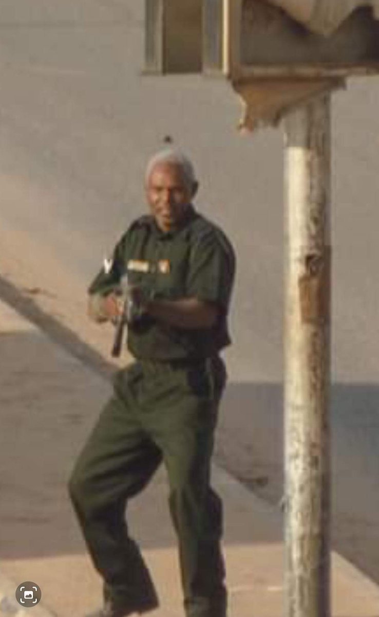 ShalallIslam's tweet photo. No one knows this guy, he appeared in 19 December protest with weapon in his hand wearing force uniform, no one knows which force!?? https://t.co/nSgdQcTxkZ