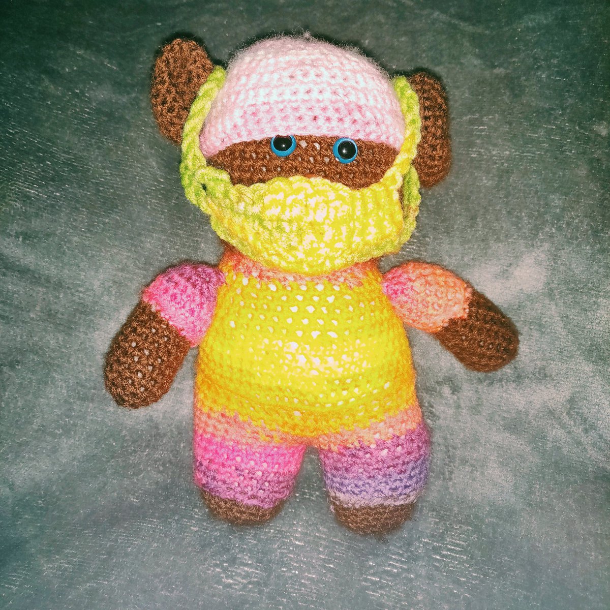 HollyCrochets's tweet photo. This little one is still being safe this year and wearing his mask take a look at Etsy for more information. 
 https://t.co/aYgGMEjedx 

#safteyfirst #wearamask #teddybear #crochet #homemade #smallbusiness #wool #rainbow #christmas #gift #Etsy https://t.co/lGjXORAcWR