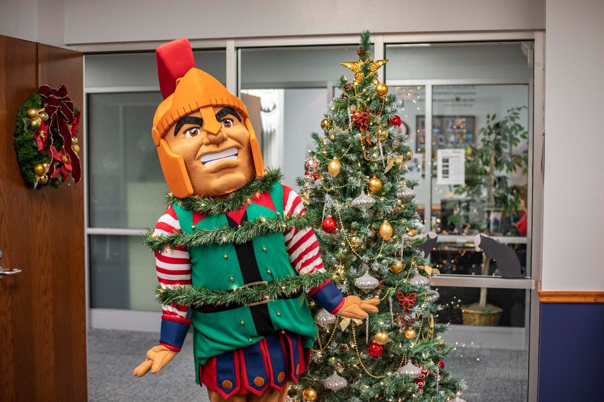 HLGuniversity's tweet photo. (3/6) He was such a fun sight, dressed in festive garb,
Hoping his sweater would hide all those Christmas carbs.
He looked around more to see what else was at hand,
And then with a wink, tied himself up with garland. https://t.co/sahd7K09TV