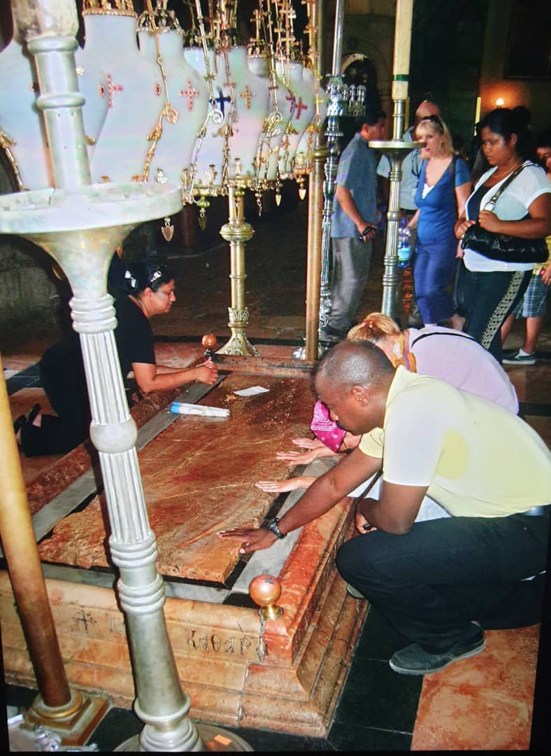 Me praying at the empty tomb of my God, Jesus Christ, in Jerusalem 12 years ago.