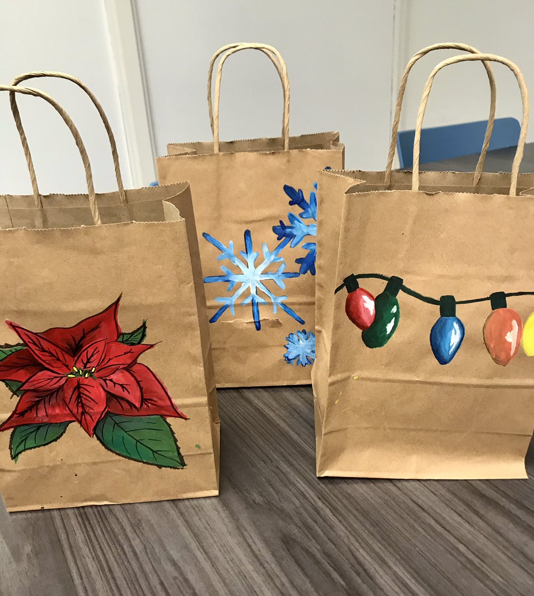 christinadmd's tweet photo. Beautiful holiday bags painted by Amelia, Ella and SC art students. Our clerical will love them! @CCPS_SCHS  @CCPSk12 https://t.co/9m83YMOpNj
