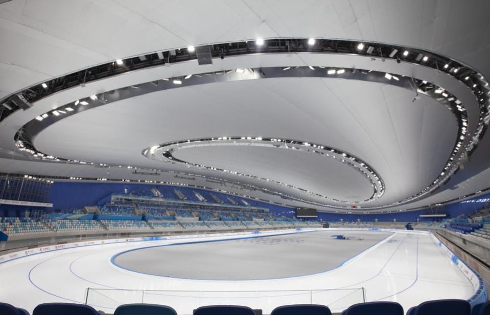 tdnewcomb's tweet photo. Meet the Ice Ribbon—the only major new venue for the Beijing 2022 Winter Olympics—and the hall's 22 curved glass tubes with LED lighting, silver ceiling and @Populous design. My @ForbesSports post https://t.co/WALf6GXS7B https://t.co/itlPQfb8io