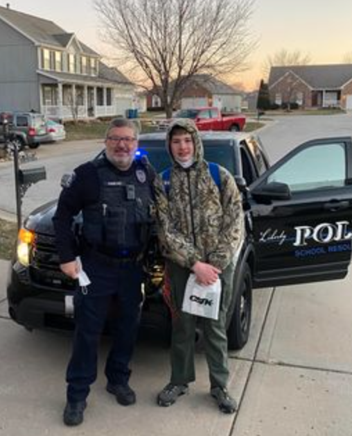 LibertyLMS's tweet photo. This 8th grader was lucky enough to win the auction to be driven to school by Officer Hamline in his police car. #LMSsoars https://t.co/4ohr3V0jci