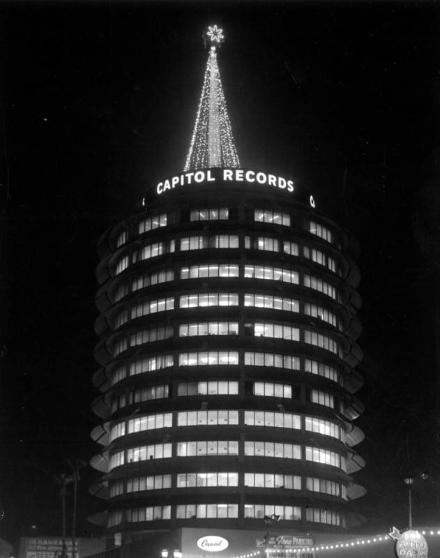 HRGpreservation's tweet photo. #HappyHolidays from Historic Resources Group! One of the greatest joys of this season is the opportunity to say THANK YOU to our clients and friends, and to wish you the very best for the New Year.

Photo: Capitol Records night view, 1962 (LAPL) https://t.co/j5IrYfESDQ