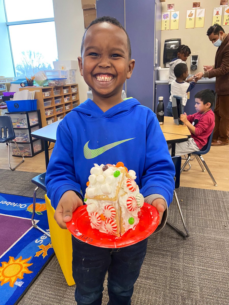 These smiles say it ALL… Our Kinders LOVED making Gingerbread Houses and licking the frosting after! #gingerbreadhouses #rpslead #smiles #kinders