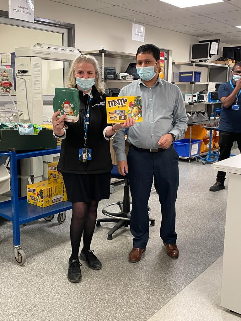 ClinicalEngMft's tweet photo. Raffle &amp; presents handed out to staff by Santa's little  helpers Joe &amp; Habib as a thank you for all their hard work this year. #teamwork #thankyou #MerryChristmas https://t.co/PU8VEiAkU8